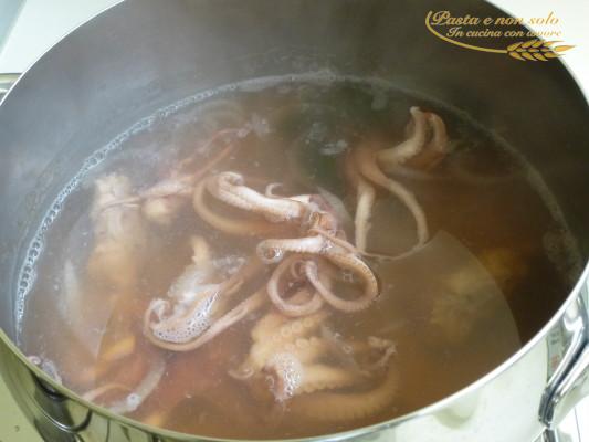 Risotto con melanzana, pesce spada, moscardini e seppia